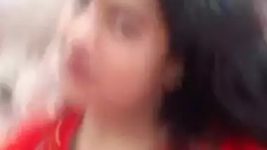 Plump amateur Desi wife in a red sari performs hot XXX striptease