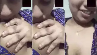 Bengali girl sucking her own boobs