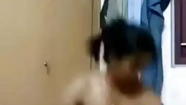 Indian MILF flashes her breasts on camera during changing in home porn