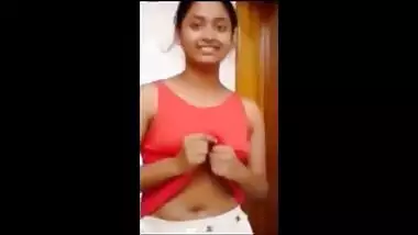 Desi quickly pulls up her T-shirt exposing XXX boobies upon sex request