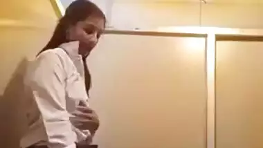 Desi college girl having fun in bathroom