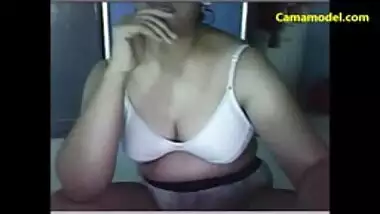 Hot sexy Indian babe showing natural tits on webcam