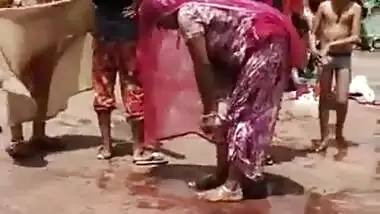 Aunty Lifting Saree Outdoor Captured Hidenly