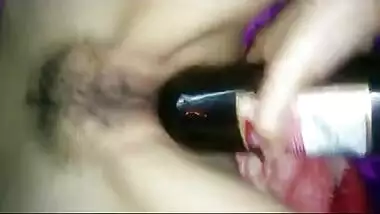 Indian girl masturbation with kingfisher bottile