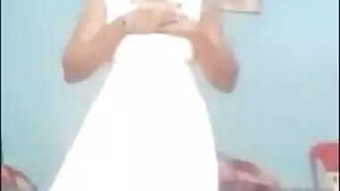 Sexy Desi accidentally flashes her XXX slit dancing in a white dress