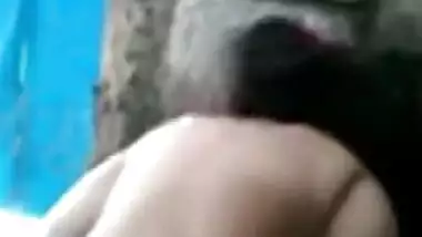 XXX hidden clip of village chubby aunty taking bath in outdoor