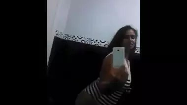 Horny aunty performing an erotic dance