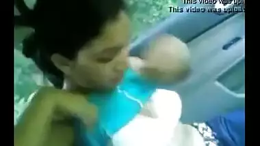 Juvenile couple have some romantic outdoor fun in their car