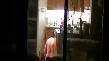 Neighbour in her kitchen