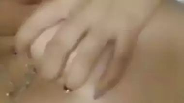 Relaxed Desi gal touches own XXX boobs and sweet vagina on camera