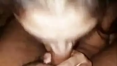 Indian mature wife giving blowjob to young