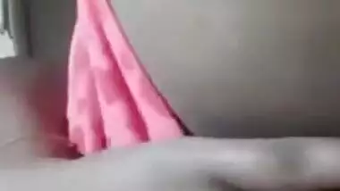 Desi cutie in pink actively XXX fingers her wet pussy on the bed