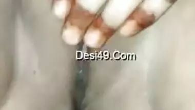 Indian aunty with tattooed hand touches XXX hollow called a vagina