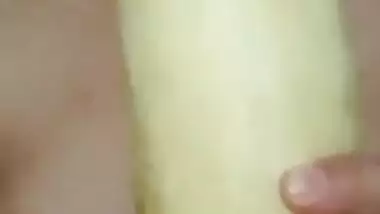 Horny girl sucking cucumber