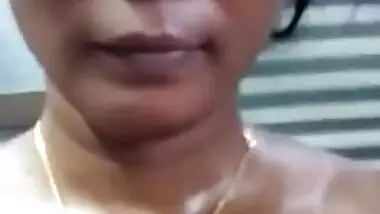 Indian bares her XXX boobies and wears a bra for close-up sex video