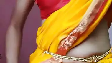 Indian shemale enjoys strip teasing and masturbating