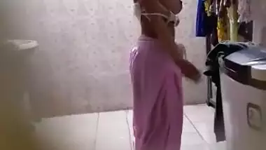 Desi girl with big boob dress change shot secretly by friend.