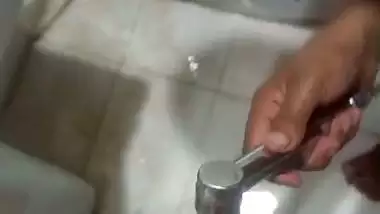 Mature aunty in bathroom sucking husband friend dick