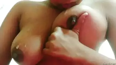 Horny desi girl self sucking her big boobs