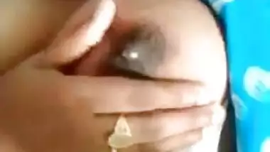 Desi Bhabhi showing her milking boobs