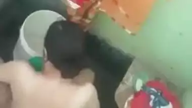 Female wears a yellow Indian sari after flashing her charms in voyeur porn video