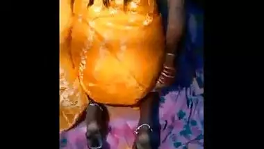 Village ass fucks an orange dildo