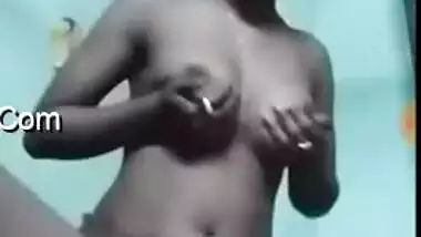 Winsome Desi with earrings licks nipples in the shower room