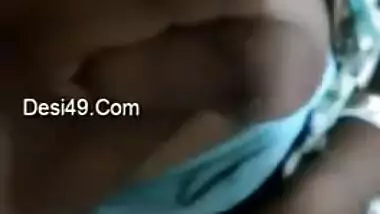 XXX-shaped boobs of slutty Indian are taken out and touched by man