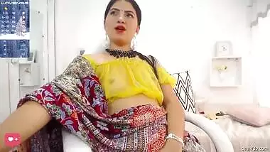 Hot Indian wife in transparent blouse and panty fingering her pussy