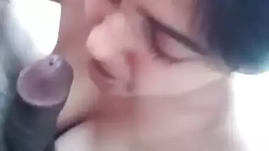 Beautiful girl giving blowjob and handjob