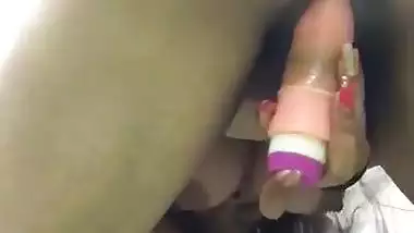 Horny milf masturbates with the dildo in the sex video