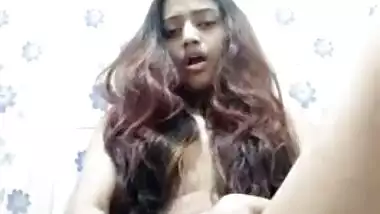 Cute Indian XXX girl moaning hard while dildoing her pussy