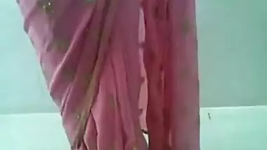 Hot Telugu bhabhi wearing a sari only to be stripped